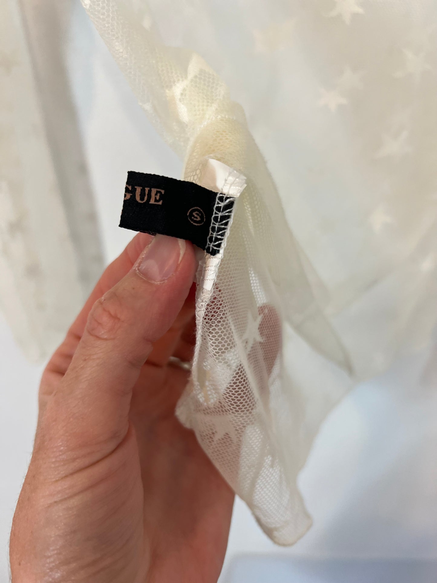 IN VOGUE.Top rejilla estrellas T.s