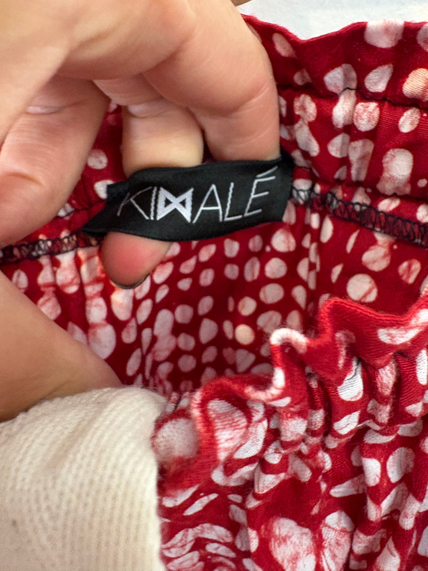 KIMALÉ. Conjunto falda y camisa roja estampada. T 36