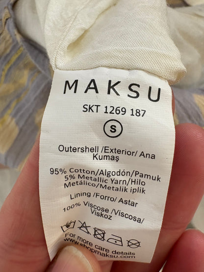 MAKSU. Falda midi detalles dorados
