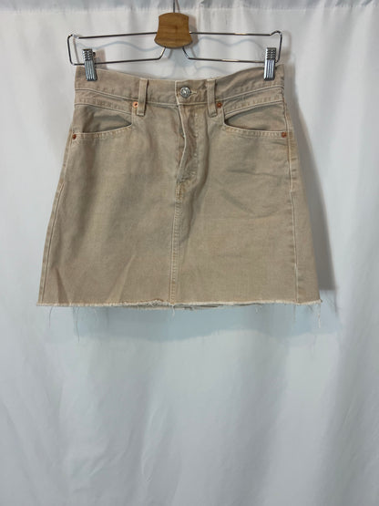 MANGO. Short beige buttoned denim skirt. TM