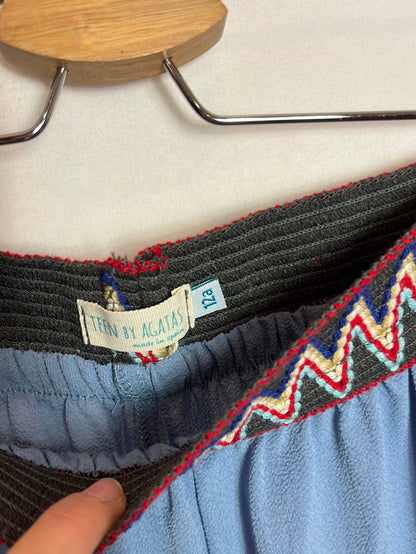 TEEN BY AGATAS. Flowy blue trousers with waist detail. Size 12 years.