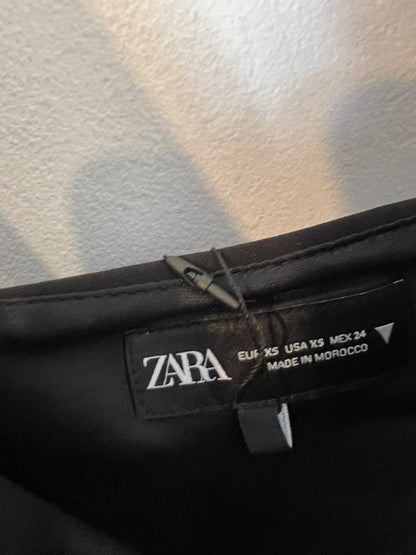 ZARA. top negro lazo pedrería. T XS