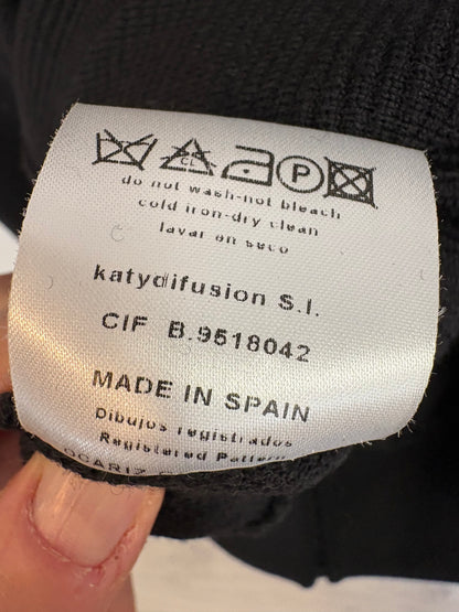 MIRIAM OCARIZ. Vestido negro textura capa