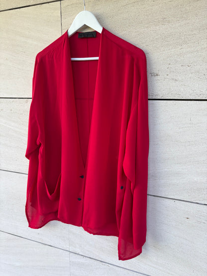 MARIA CALDERARA. Total look fluido en rojo