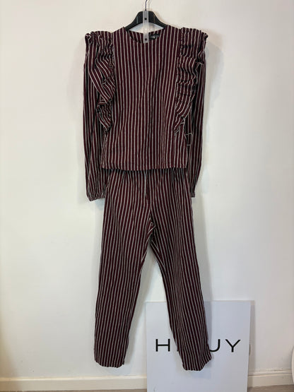 VOGANA. Conjunto top y pantalón textura volante