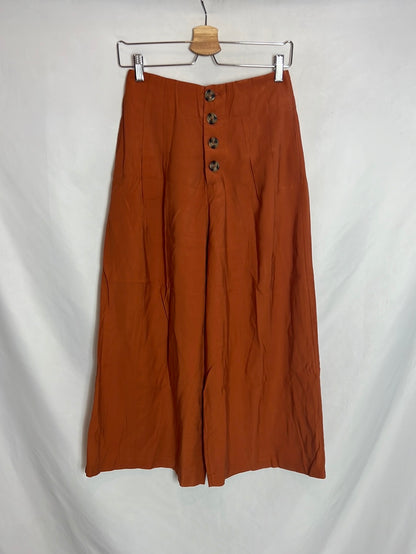 ZARA. Pantalón fluido culotte abotonado. T M