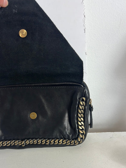 INTROPIA. Bolso de mano piel doble textura