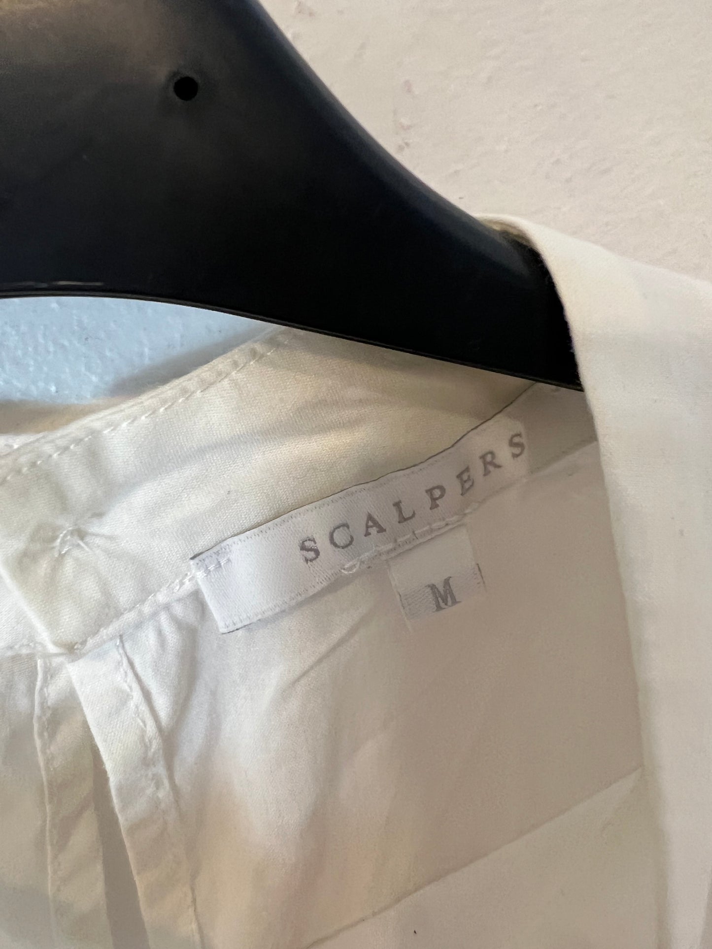 SCALPERS. White blouse with sleeve detail. TM