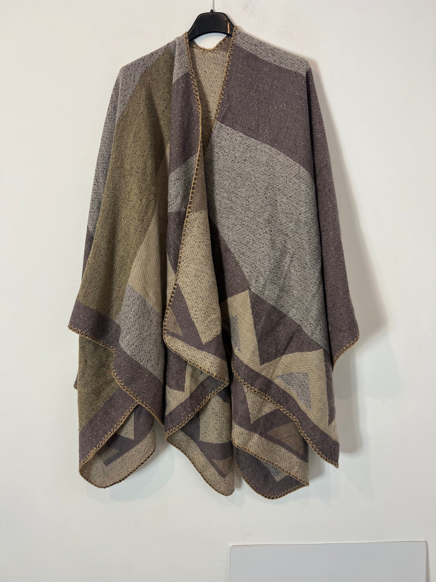 OTRAS. Capa cuadros malva jaspeada. TU