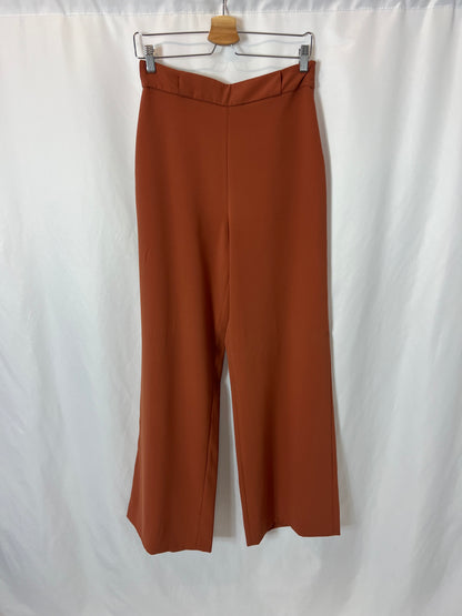 ZARA. Pantalón pata ancha fluido. T M