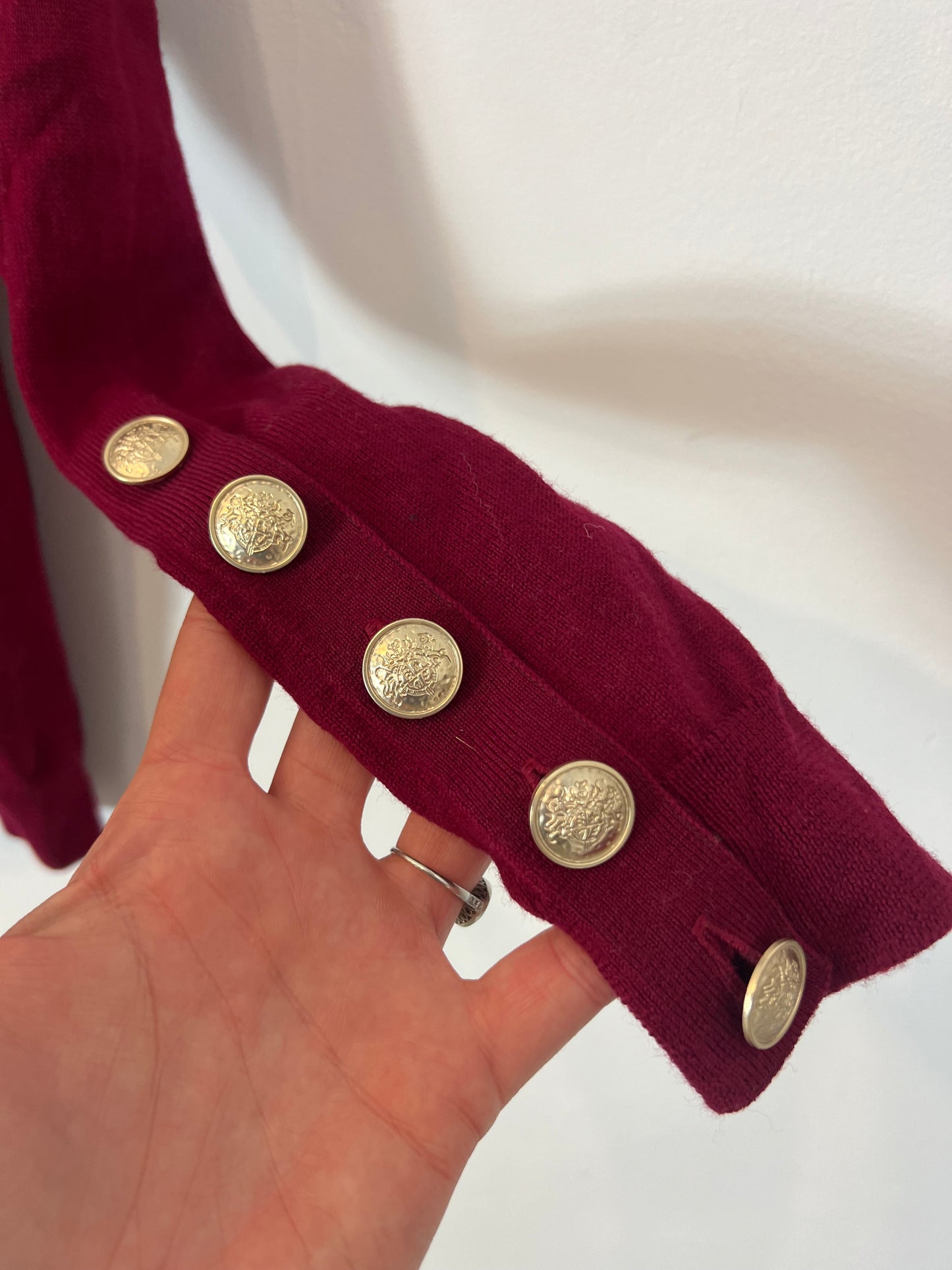 SEZANE. Burgundy wool sweater with buttons and sleeves.