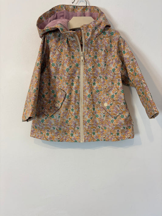 ZARA. Chubasquero flores. T 18-24 meses