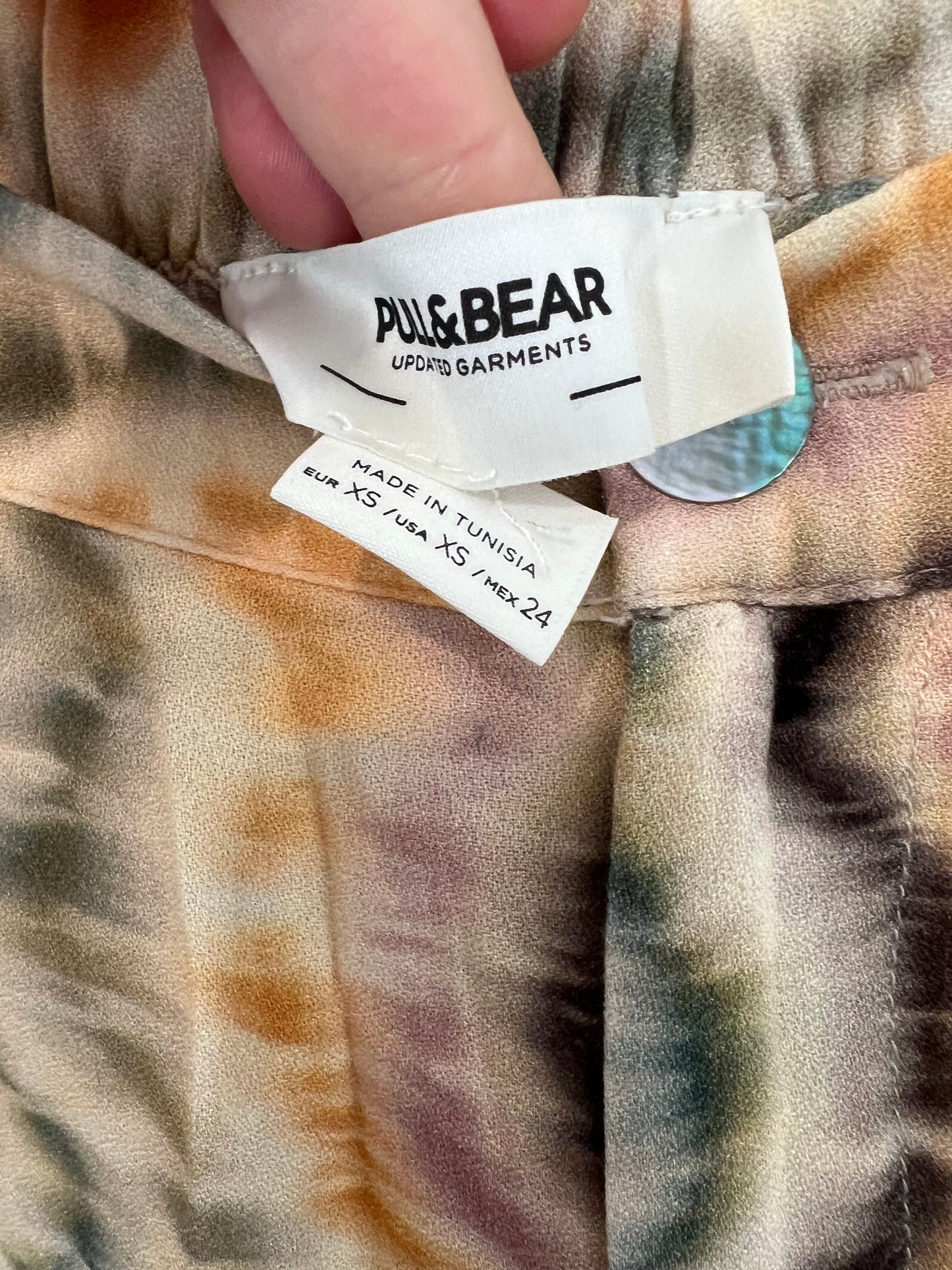 PULL&BEAR. Pantalón campana tie dye T.xs