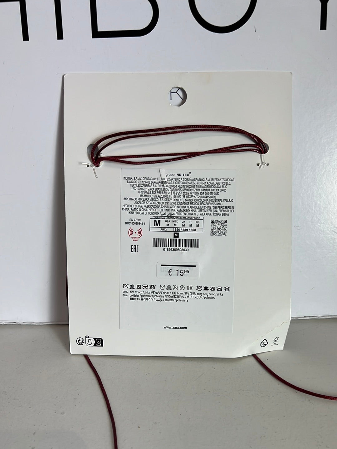 ZARA. Collar flor cordón rojo