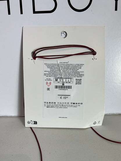 ZARA. Collar flor cordón rojo