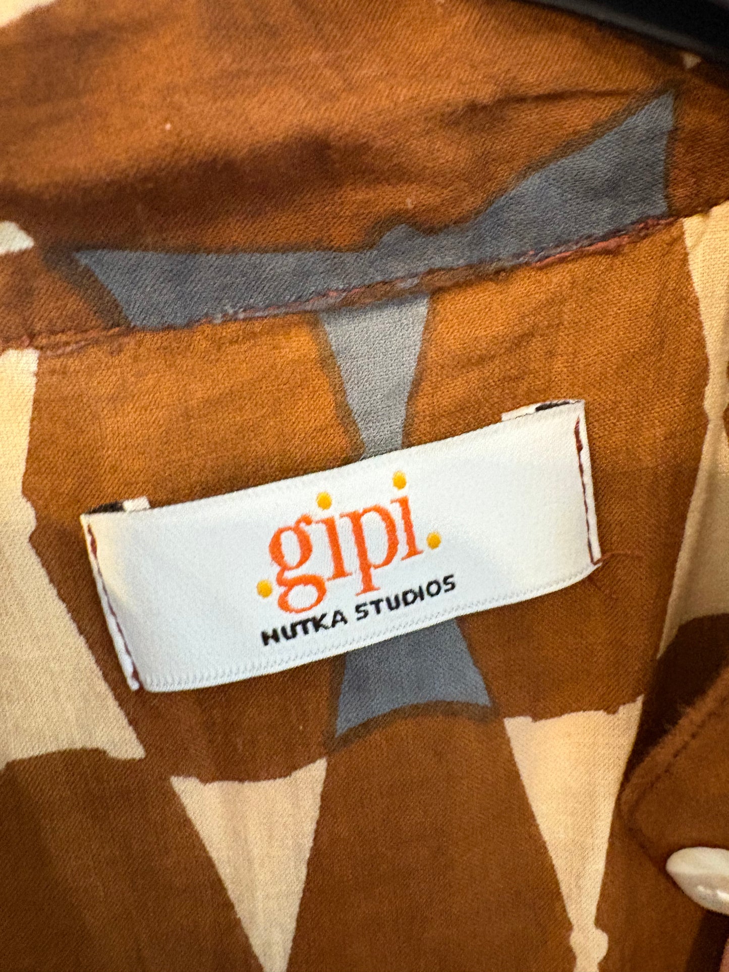 NUTKA STUDIOS. Brown printed long dress. TS