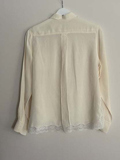 TCN. Blusa seda encaje