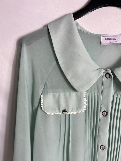 LITTLE JOY. Blusa azul claro semitransparente estilo vintage . T S (Tara)