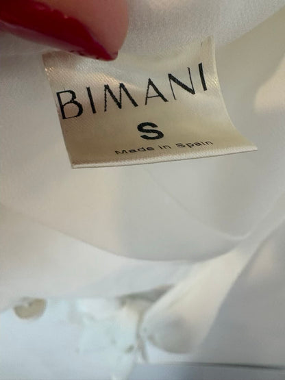 BIMANI. Blusa blanca fluida cruzada