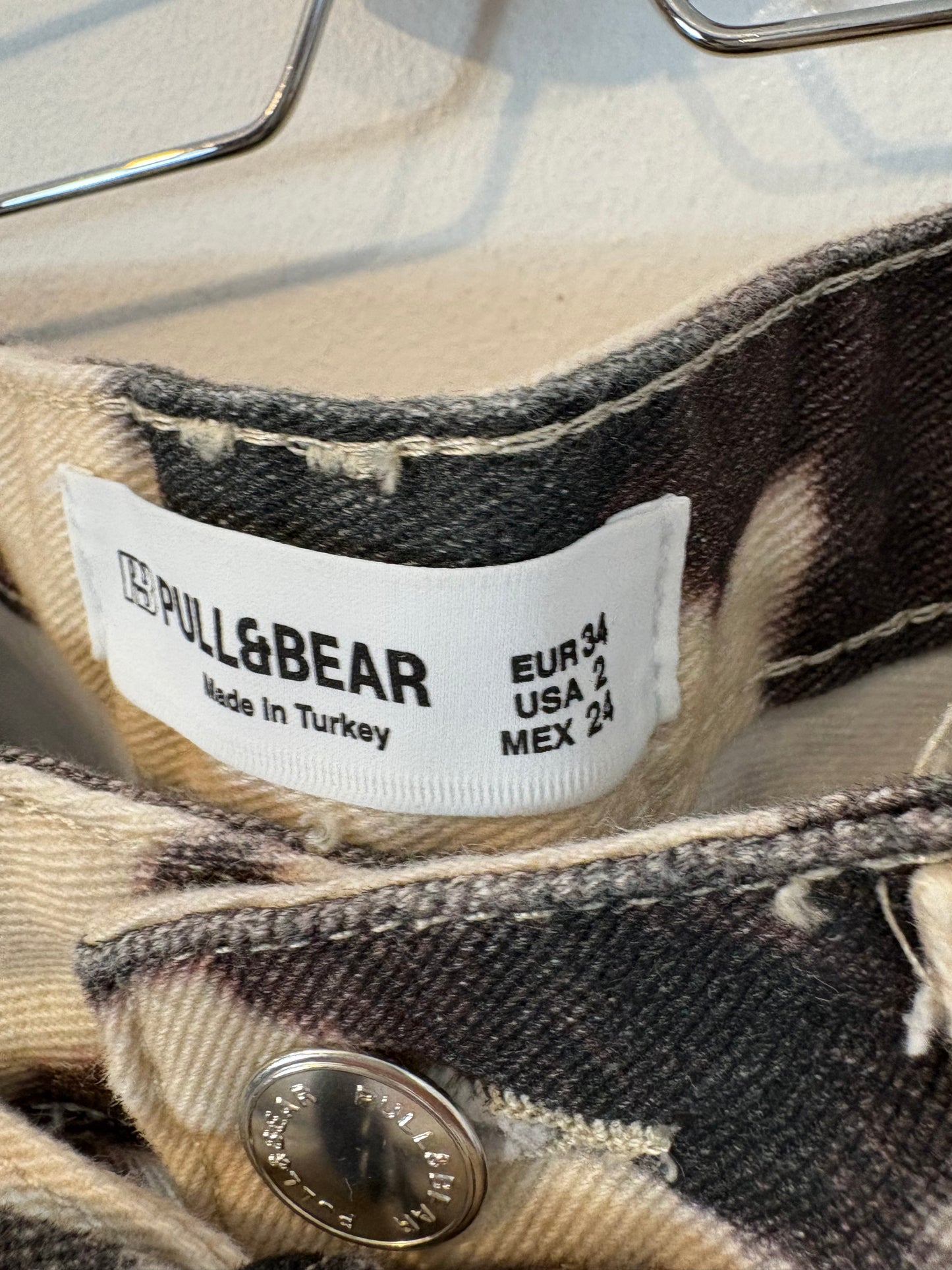 PULL&BEAR. Denim estampado pata ancha