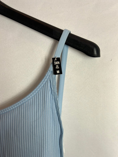 PINK. Bañador azul claro aperturas. T M