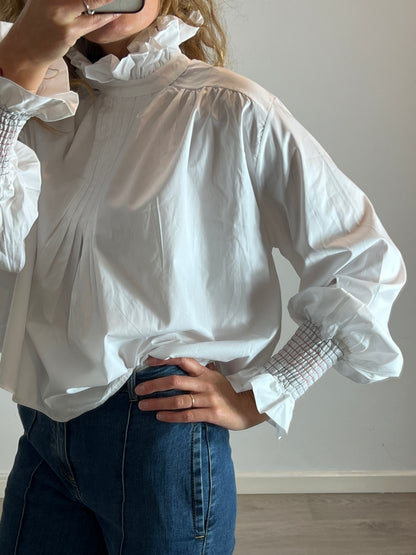 LAGANINI. Blusa blanca volante cuello T.s/m