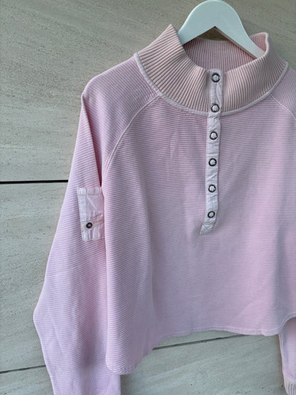 FREE PEOPLE MOVEMENT. Sudadera rosa claro textura