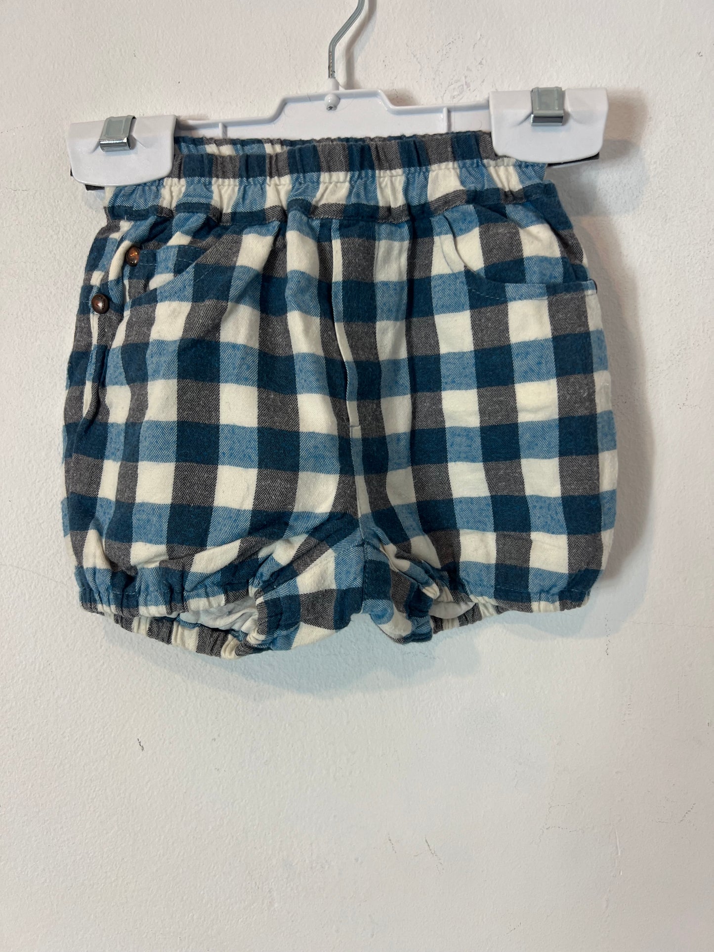 PILI CARRERA. Cubre pañal cuadros. T 12 meses