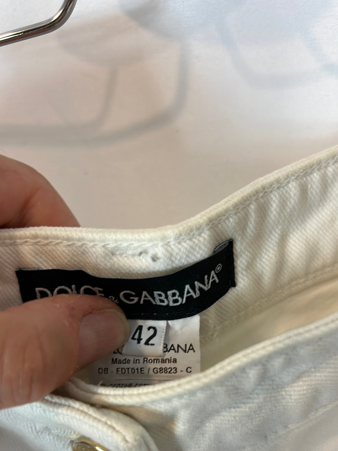 DOLCE&amp;GABBANA. White denim shorts with lace detail. Size 40
