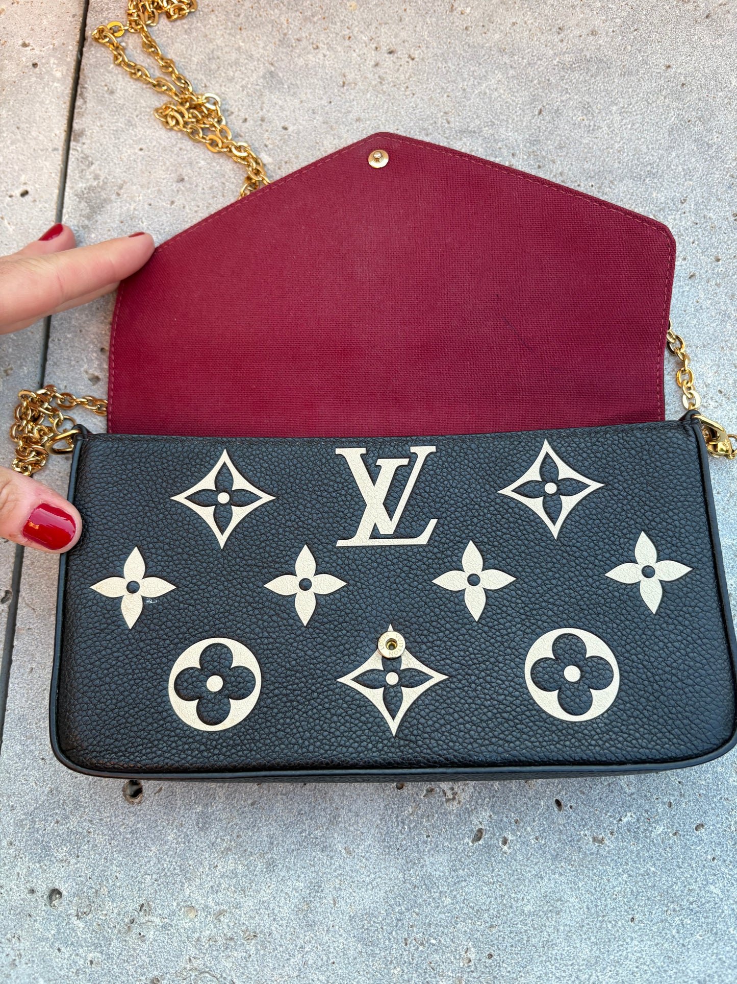 LOUIS VUITTON. Cartera de mano Félicie