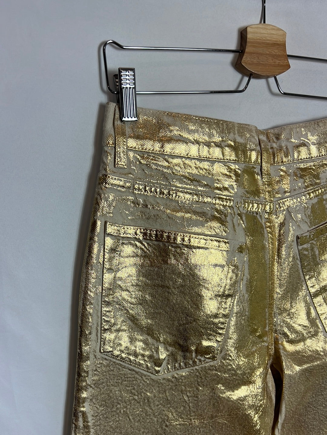 ZARA. Gold distressed denim trousers. Size 38