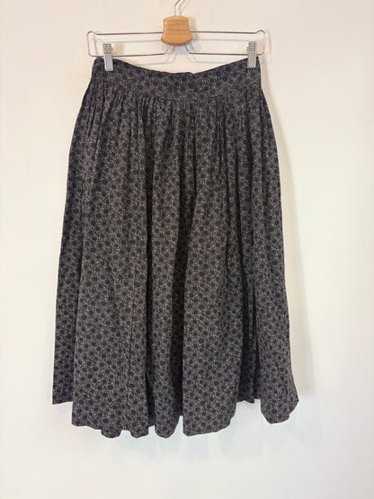 EVA VELAZQUEZ. Blue printed midi skirt. T.S.