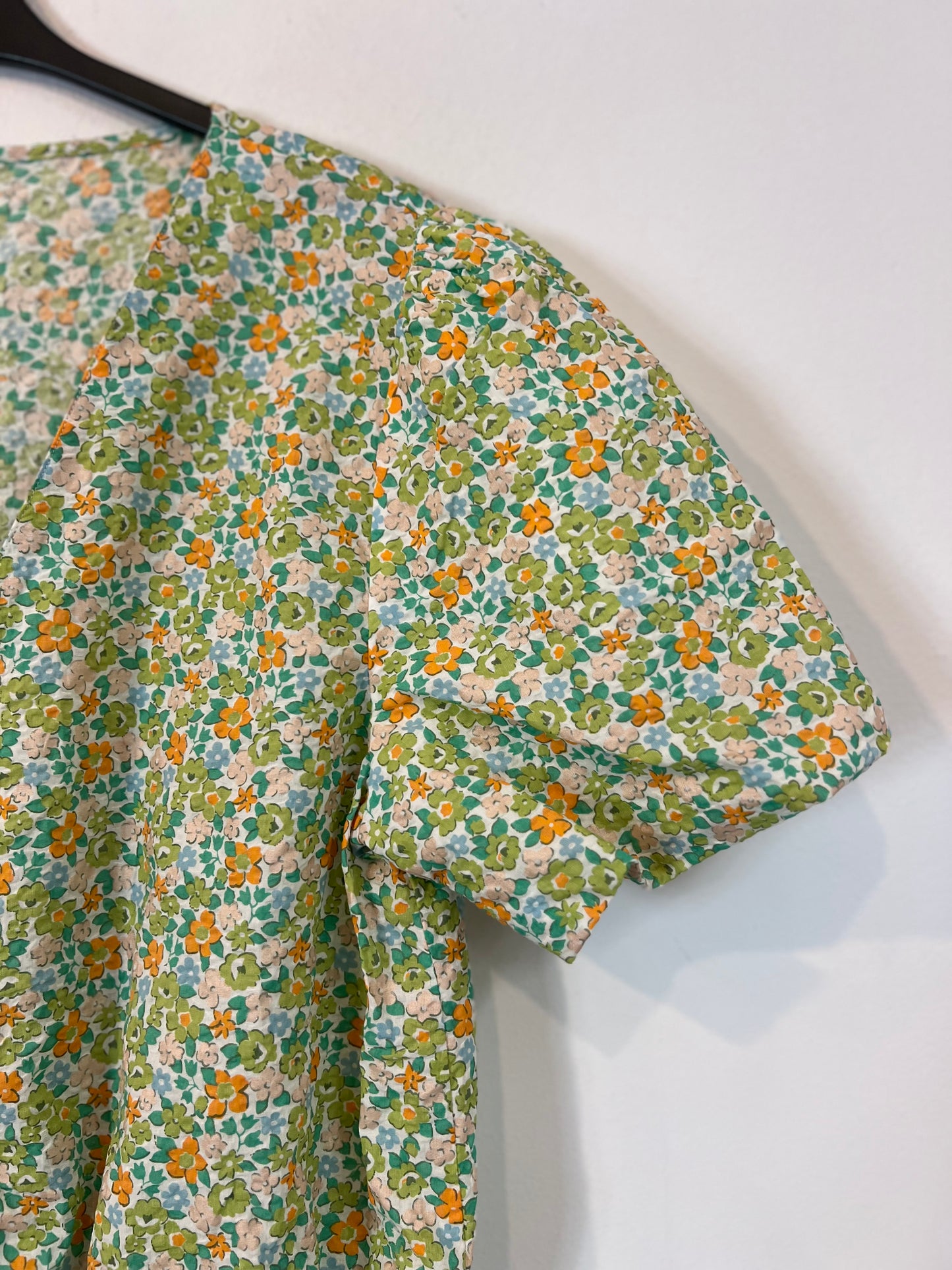 OTRAS. Mono corto flores TU(S)