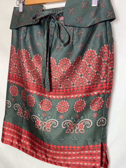 TRUCCO. Falda corta verde estampada T.38