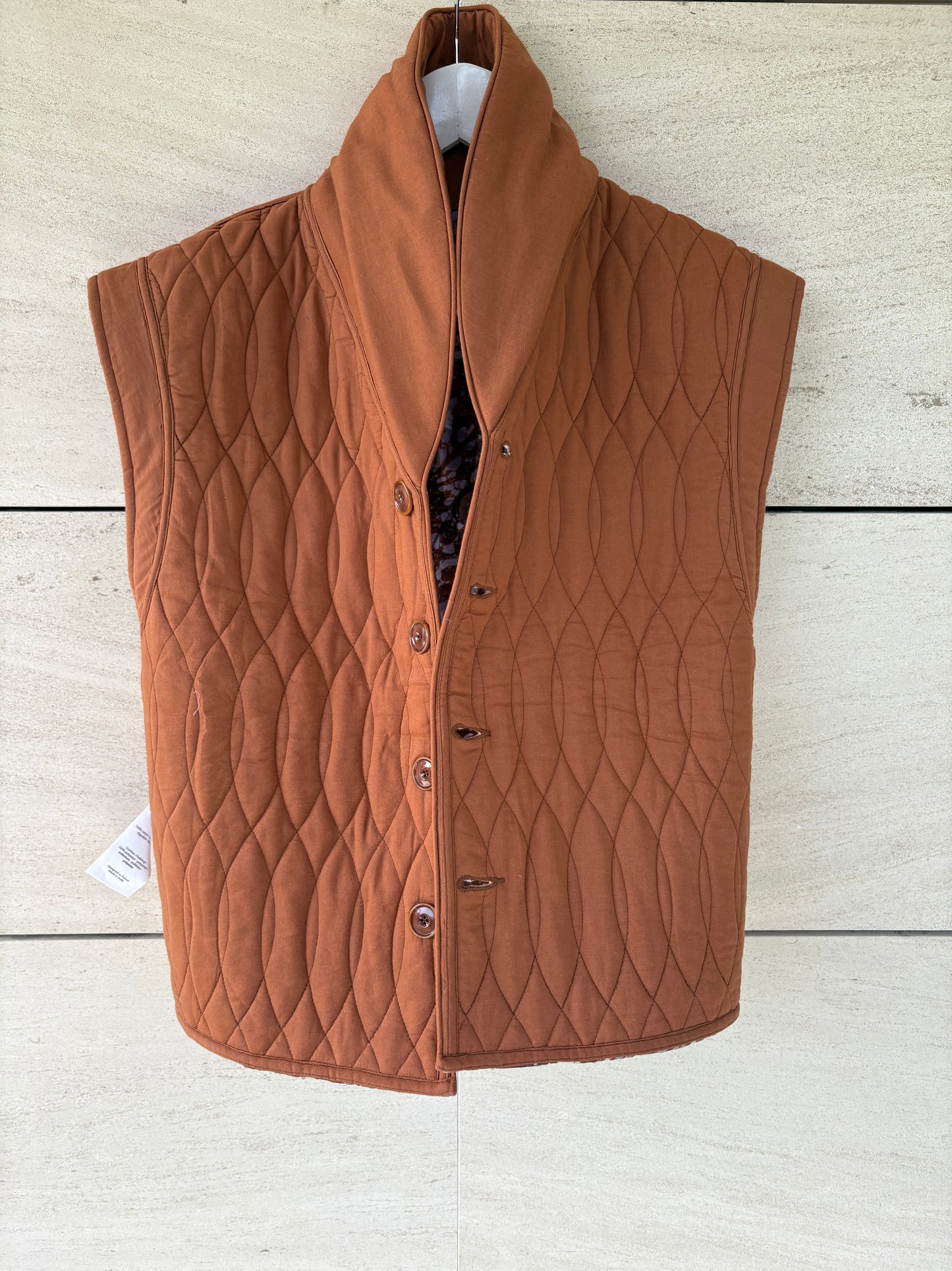 SESSÚN. Chaleco acolchado reversible