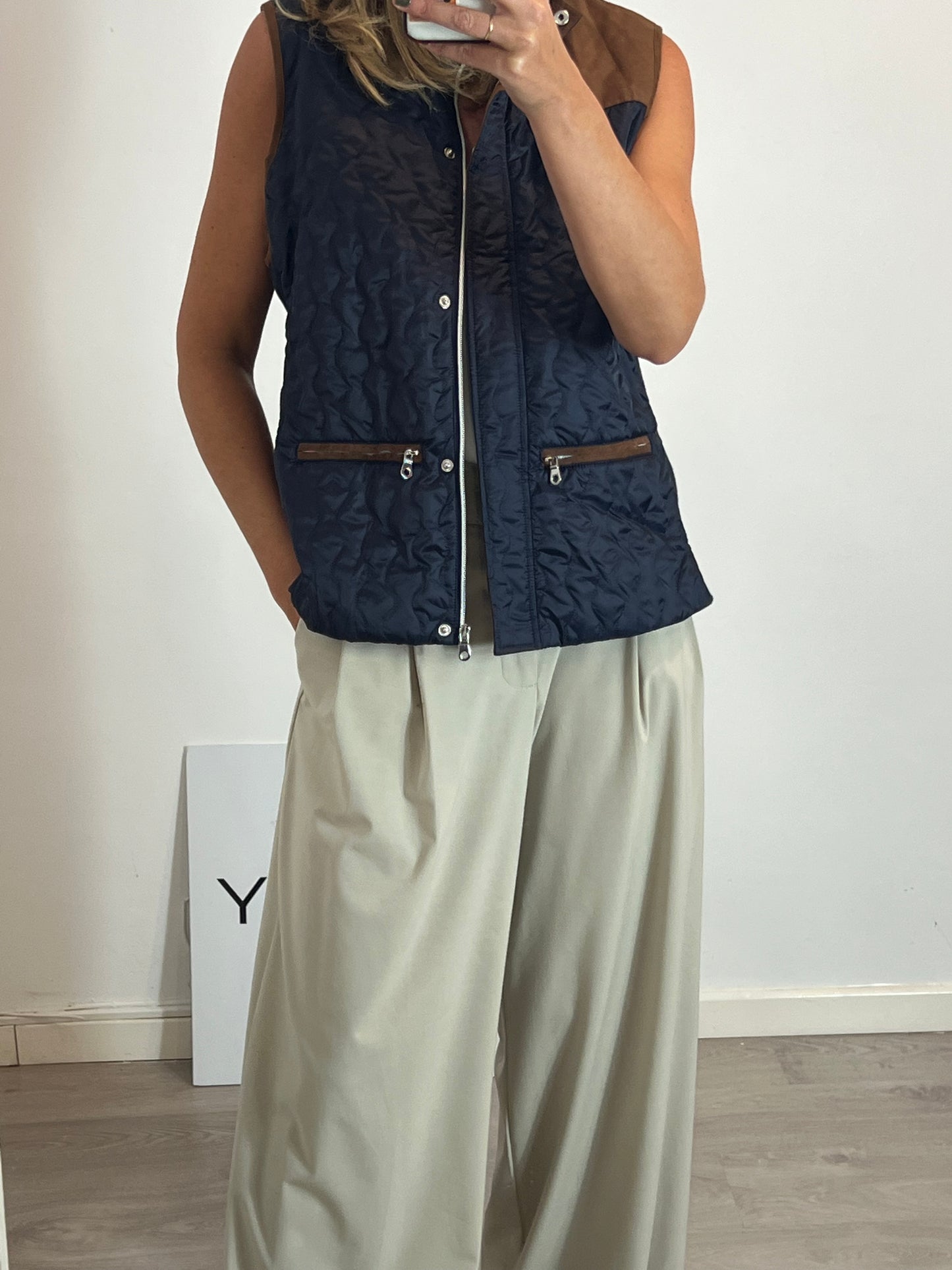 LLOYD'S. Blue down jacket with suede detailing.