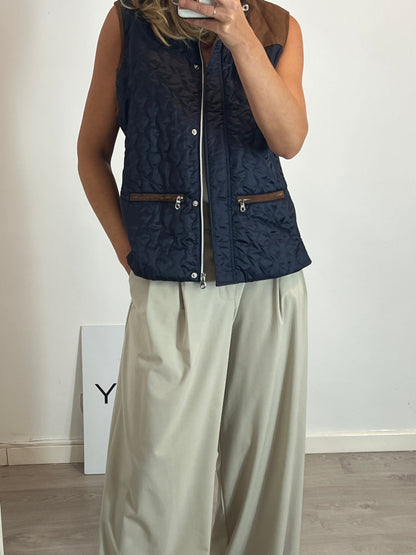 LLOYD'S. Blue down jacket with suede detailing.