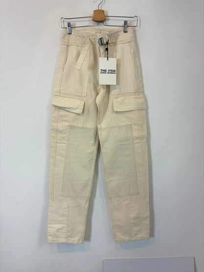 ZARA. Denim beige bolsillos