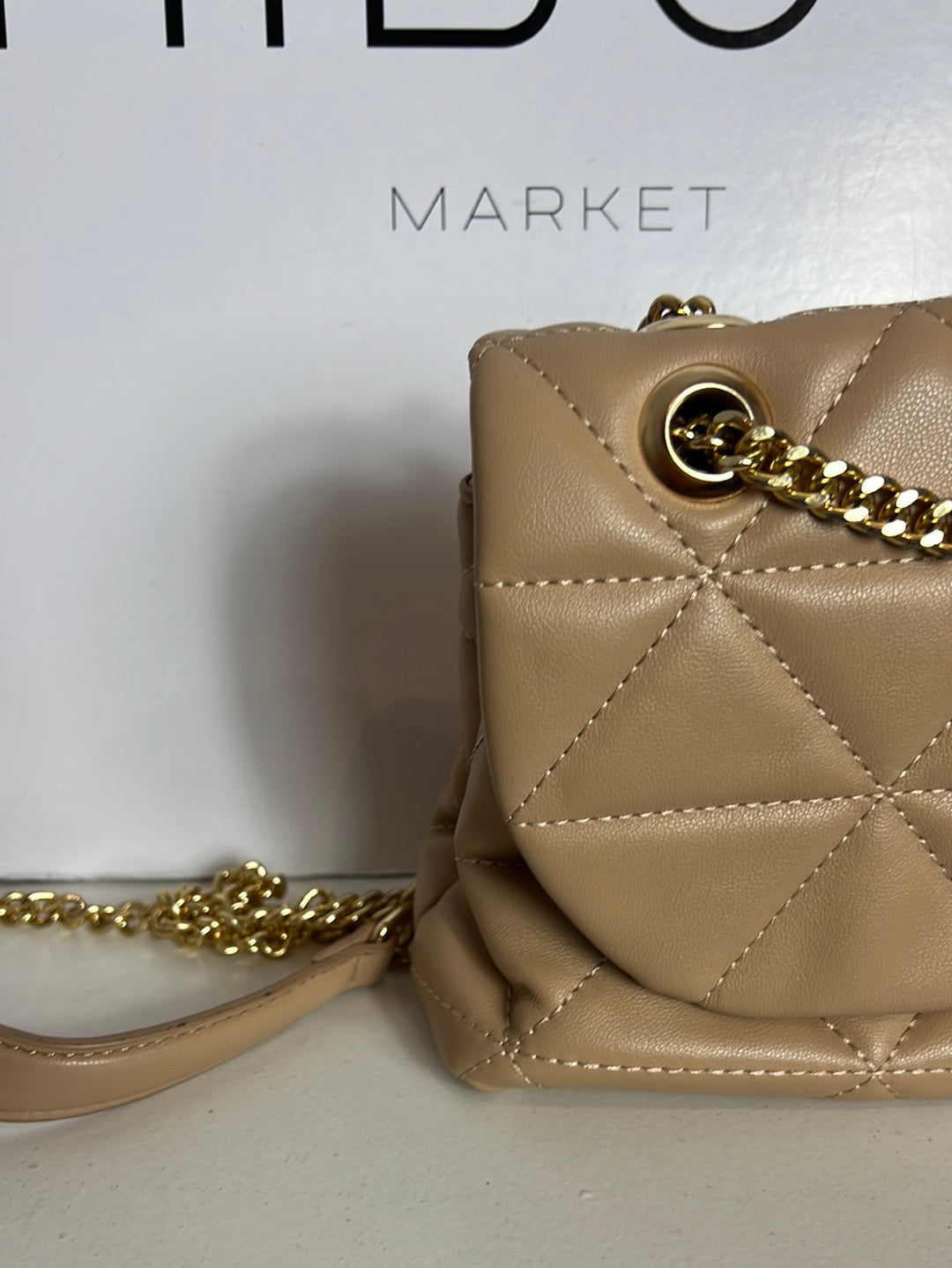 OTRAS. Bolso beige guateado