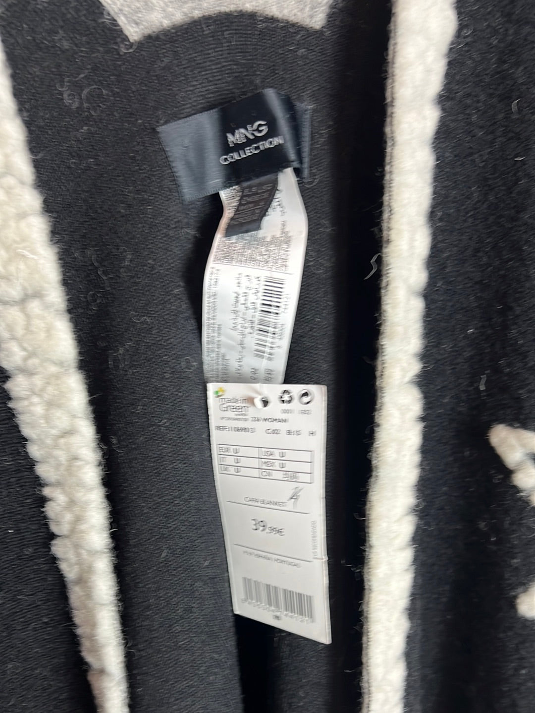 MANGO. Capa negra y beige texturas. T U