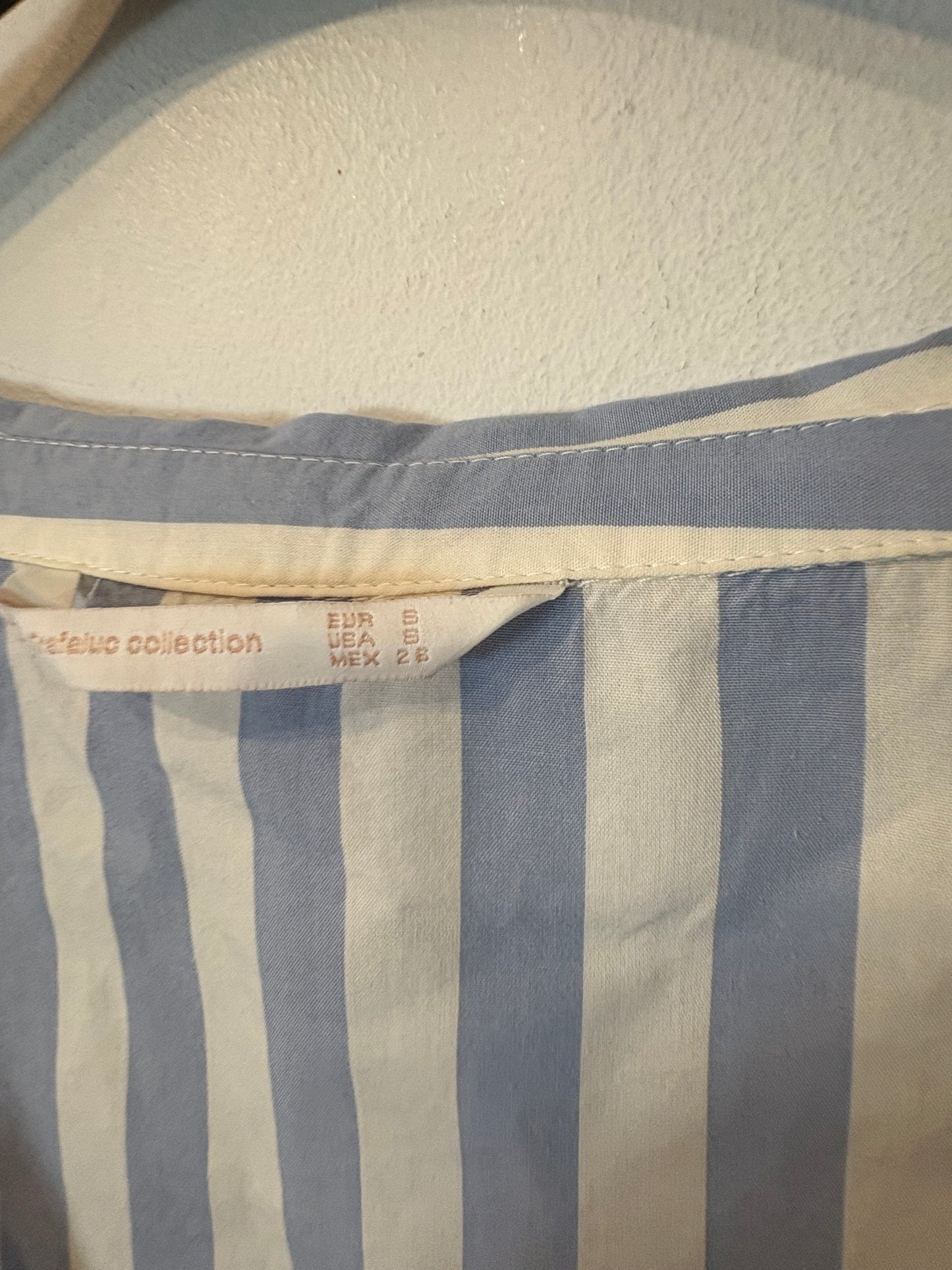 ZARA. Blusa rayas cruzada