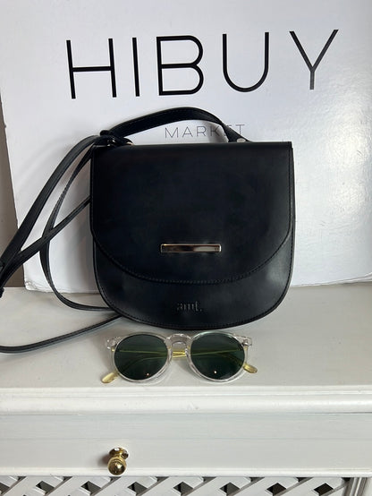 AMT. Flat black mini bag