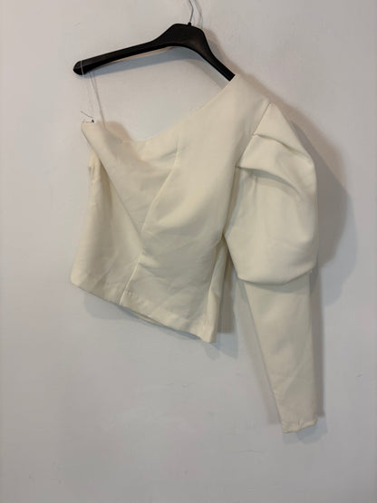 OTHERS. White asymmetrical top with puffed sleeves. TM