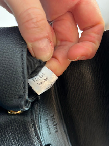 POLLENE. Black mini bag with long handle