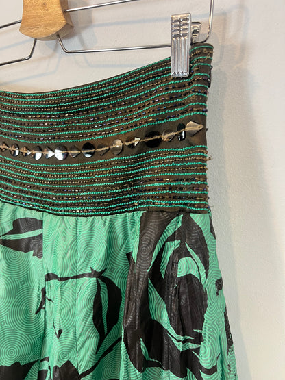 KAVITA BHARTIA. Falda larga detalle abalorios . T M