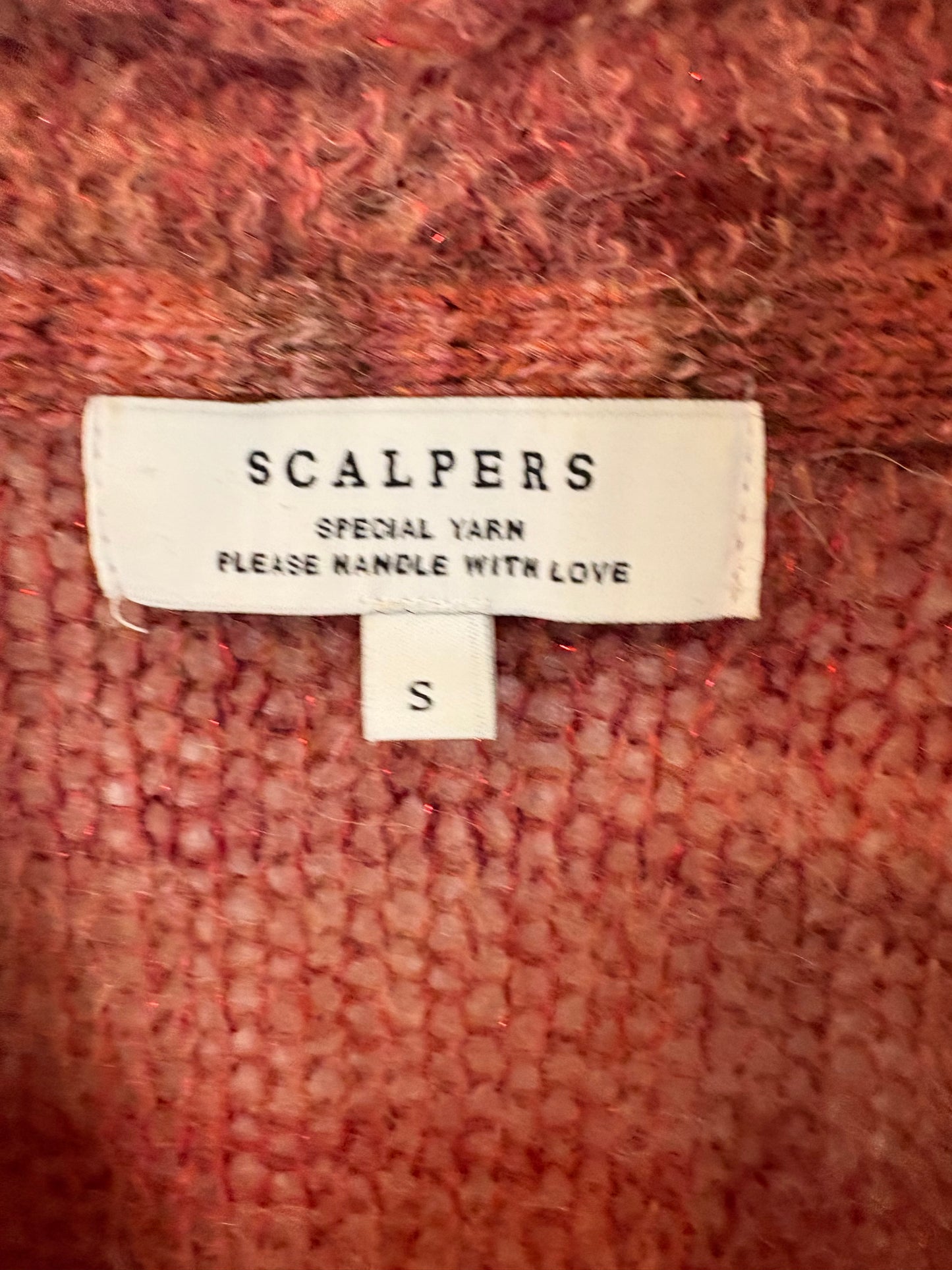 SCALPERS. Jersey jaspeado burdeos