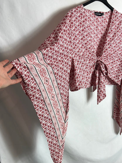 PRETTYLITTLETHING. Top nudo detalle mangas. T 38