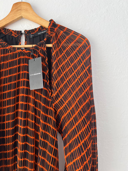 SFERA. Black and orange pleated dress TM