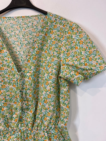 OTRAS. Mono corto flores TU(S)