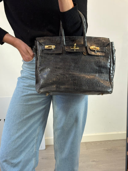 OTRAS. Bolso de mano gris piel